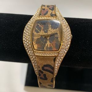 Gold bracelet watch, with cheetah print and crystals